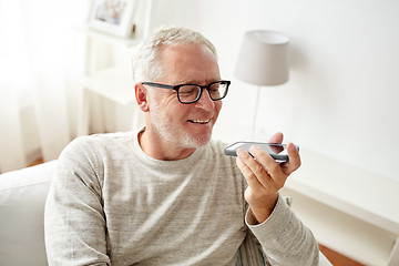 Image showing old man using voice command recorder on smartphone