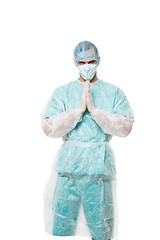 Image showing Surgeon portrait. isolated on white background. focuses on reflection. fingers pyramid. praying