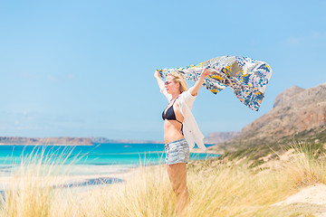 Image showing Free Happy Woman Enjoying Sun on Vacations.