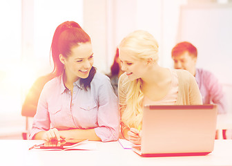 Image showing students with laptop, tablet pc and notebooks