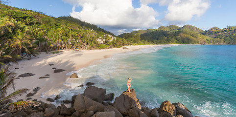 Image showing Woman on summer vacations on tropical beach of Mahe Island, Seychelles.