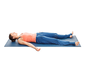 Image showing Women relaxes in yoga asana Savasana