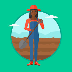 Image showing Farmer on the field with shovel.