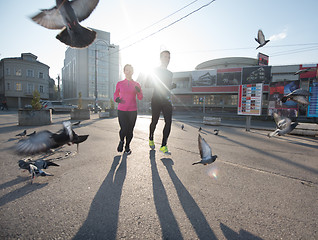 Image showing young  couple jogging