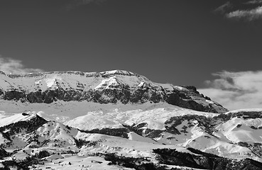 Image showing Black and white snowy mountains at nice sun winter day