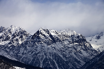 Image showing Snow sunlight mountain in haze at winter day