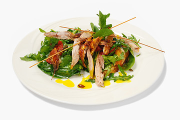 Image showing Pumpkin salad with crispy duck and greens