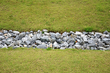 Image showing Stone and green grass