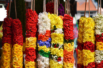 Image showing Flower stall selling garlands for temple offerings