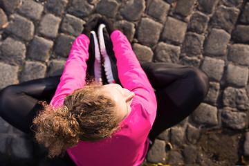 Image showing woman  stretching before morning jogging