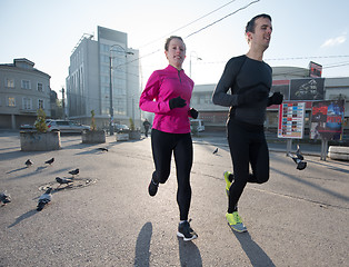 Image showing young  couple jogging