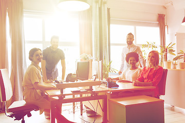 Image showing happy creative team in office