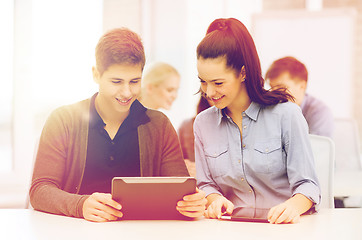 Image showing students looking at tablet pc in lecture at school