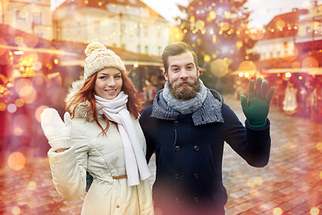 Image showing happy couple walking in old town