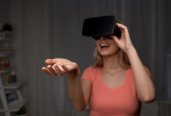 Image showing happy woman in virtual reality headset or glasses 