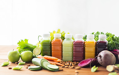 Image showing bottles with different fruit or vegetable juices