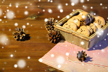 Image showing close up of christmas oat cookies on wooden table