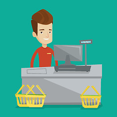 Image showing Cashier standing at the checkout in supermarket.