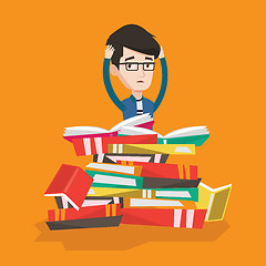 Image showing Student sitting in huge pile of books.