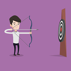 Image showing Archer aiming with bow and arrow at the target.