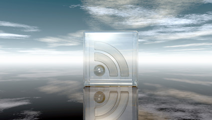 Image showing rss symbol in glass cube under cloudy blue sky - 3d illustration