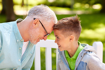 Image showing grandfather and grandson at summer park