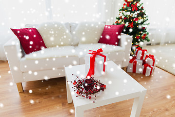 Image showing close up of christmas gift box on table at home