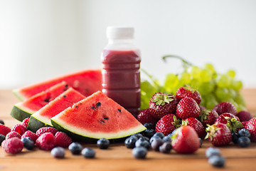 Image showing bottle with fruit and berry juice or smoothie