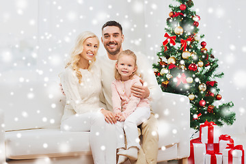 Image showing happy family at home with christmas tree