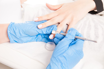 Image showing Specialist making manicure