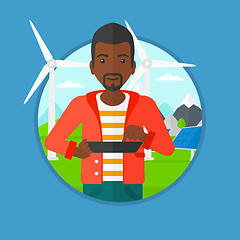 Image showing Male worker of solar power plant and wind farm.