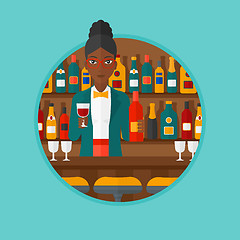 Image showing Bartender standing at the bar counter.