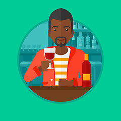 Image showing Man drinking wine at restaurant.