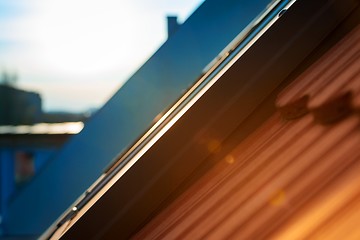 Image showing Roof tile over blue sky