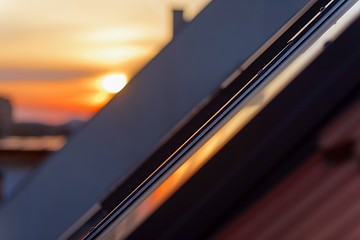 Image showing Roof tile over blue sky