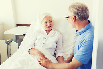 Image showing senior couple meeting at hospital ward