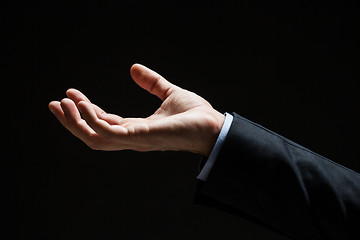 Image showing close up of businessman with empty hand