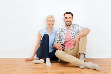 Image showing happy couple of man and woman to new home