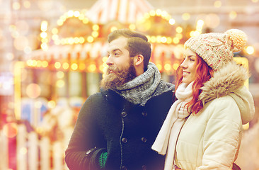 Image showing happy couple walking in old town