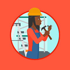 Image showing Worker hammering nail vector illustration.