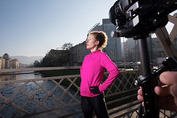 Image showing woman  stretching before morning jogging