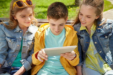 Image showing students or friends with tablet pc outdoors