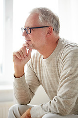 Image showing close up of smiling senior man in glasses