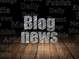 Image showing News concept: Blog News in grunge dark room