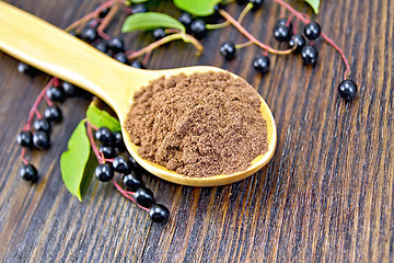 Image showing Flour bird cherry in spoon on board