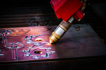 Image showing CNC Laser plasma cutting of metal, modern industrial technology.