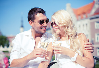 Image showing couple drinking wine in cafe