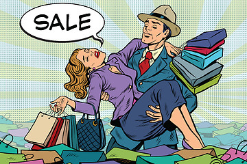 Image showing Retro man rescues a woman from sales and purchases