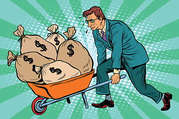 Image showing Businessman wheel heavy garden cart with money