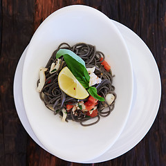 Image showing Black spaghetti with prawns and mussels